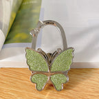 Butterfly Foldable Handbag Hook – Stylish, Portable & Non-Slip Bag Hanger